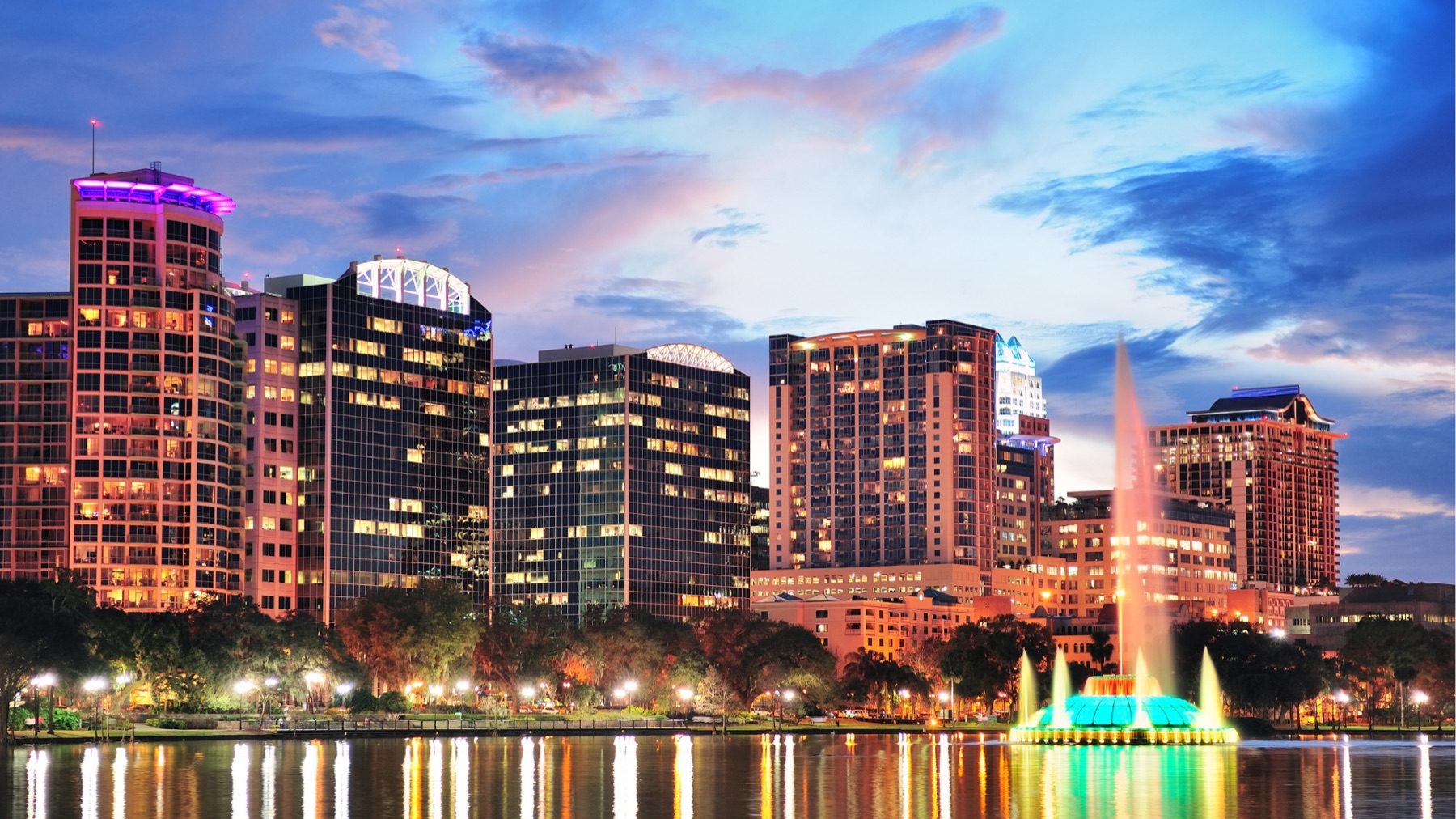 Downtown Orlando skyline at Lake Eola — Class A office and condo product now working through the REO pipeline